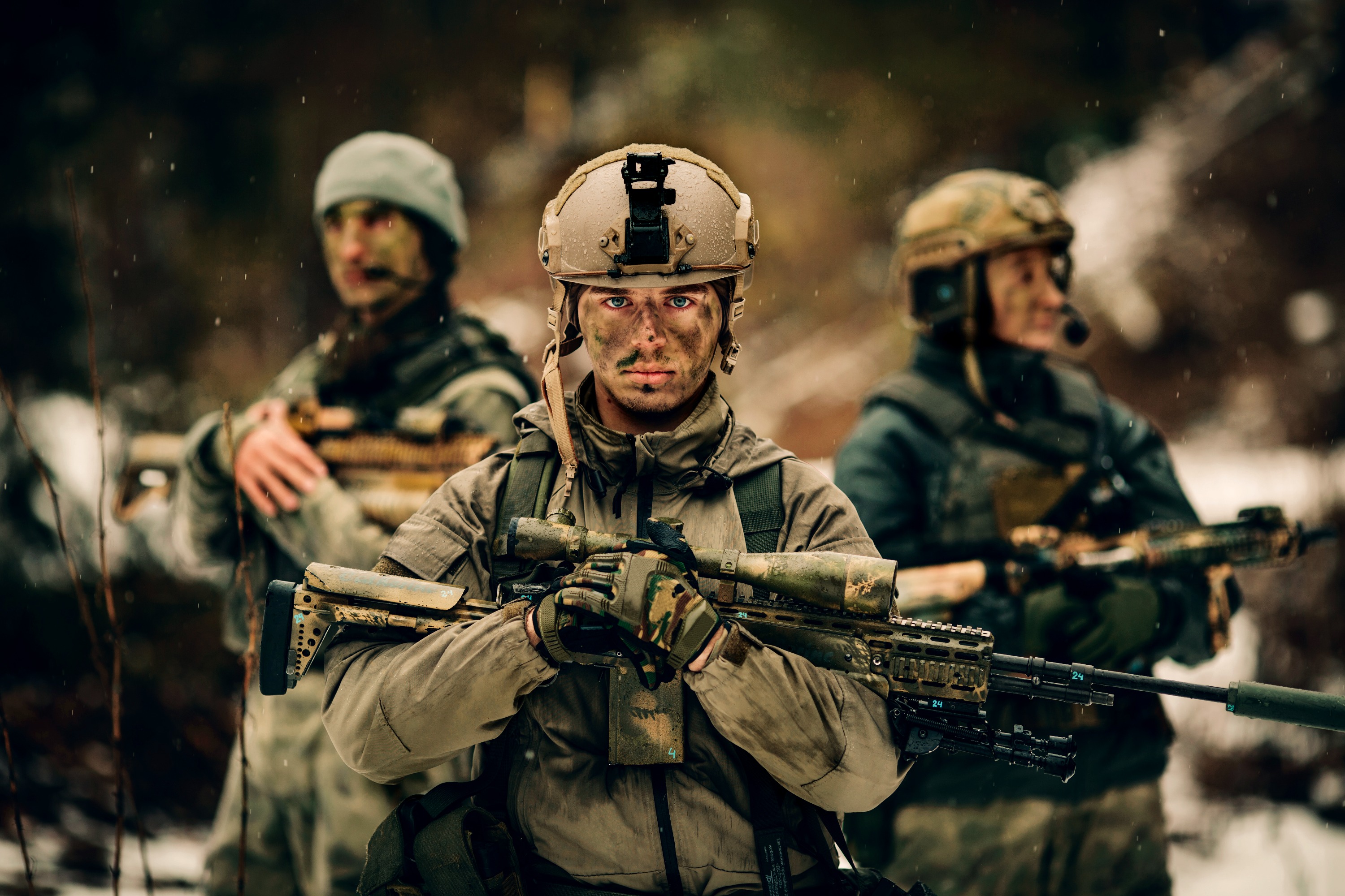 Tactical soldiers in snowy terrain